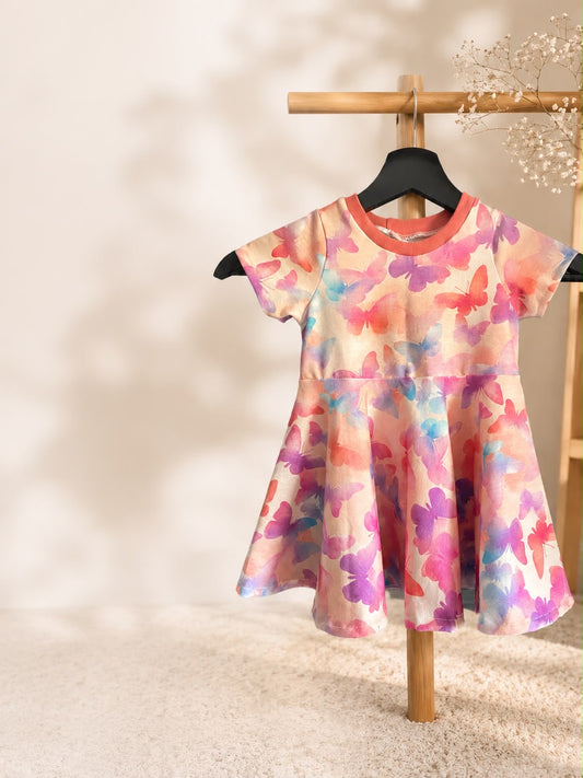 Drehkleid mit Schmetterling, apricot