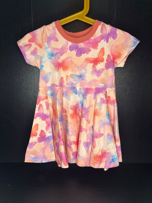 Drehkleid mit Schmetterling, apricot